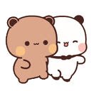 a couple of teddy bears standing next to each other .