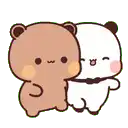 a couple of teddy bears standing next to each other .