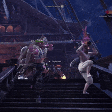 a group of people are standing on a set of stairs and one of them has the name gryfounet on the screen