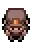 it looks like a pixel art of a person with a beard .