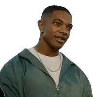 a man wearing a white shirt and a green jacket has a zipper on his jacket