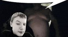 a black and white photo of a boy with a speech bubble