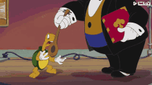 The Troubadour Mickey Donald Goofy The Three Musketeers GIF