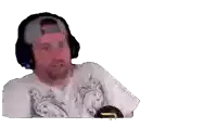 a man with a beard wearing headphones and a hat looks surprised