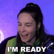 a woman says i 'm ready in front of a blue background