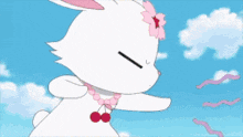 a group of anime characters are standing around a table with a rabbit and a cat