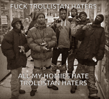 a group of young men posing for a photo with the caption " fuck trollistan haters "