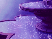 a purple fountain with circles on the floor