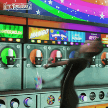 a cartoon character is standing in front of a machine that says mango on it