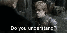 a man in a leather jacket is talking to another man with the words do you understand below him
