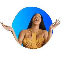 a woman is laughing with her arms outstretched in front of a blue background