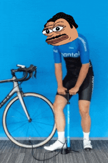 a man wearing a blue shirt that says mantel pumps his bicycle