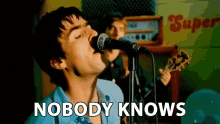 Nobody Knows Liam Gallagher GIF - Nobody Knows Liam Gallagher Noel Gallagher GIFs