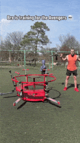 a man is holding a barbell in front of a merry go round with the words bro is training for the avengers