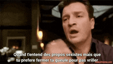 a man in a black shirt says quand t'entend des propos sexistes