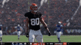 a football player with the number 80 on the back of his jersey