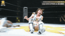 a woman in a wrestling ring is screaming in a foreign language with the hashtag #pw_mg on the bottom