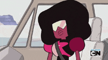 a cartoon character from cn sits in a car seat