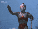 a cartoon character with the word ultraman on the top