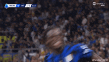 a soccer player celebrates a goal against laz on tnt sports 2
