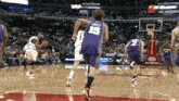 a basketball player with the number 15 on their jersey