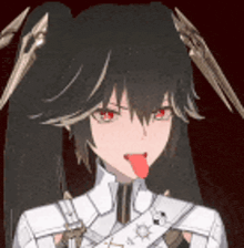 a girl with black hair is sticking out her tongue .