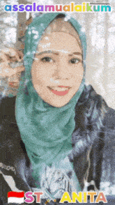 a woman wearing a hijab and a t-shirt with a tiger on it says assalamualaikum