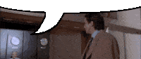 a man in a suit and tie stands in a room with a clock on the wall and a speech bubble above him