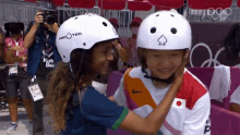 hugging rayssa leal nishiya momiji brazil olympic team japan olympic team