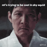 a close up of a man 's face with a caption that says `` mfs trying to be cool in sky squid ''