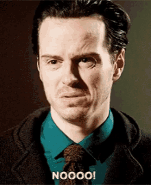 a man in a blue shirt and tie is making a funny face with the word nooo written below him