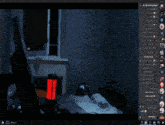 a computer screen shows a man talking on a phone