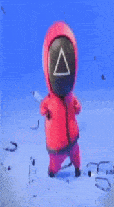 a cartoon character in a red suit with a triangle on his face is standing in the snow .