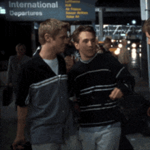 a sign that says international departures on it
