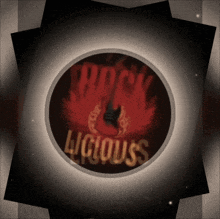 a sign that says rock ligiouss with a guitar in the center