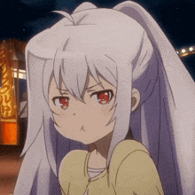 a girl with a ponytail and red eyes looks angry