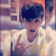 a young man in a white shirt is making a funny face