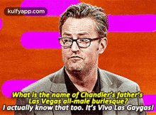 a man in a suit and glasses is talking about the name of chandler 's father