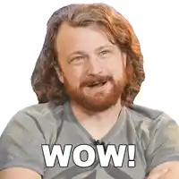 a man with a beard is wearing a shirt that says wow on it