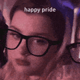 a woman wearing glasses says happy pride in a purple background