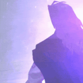 a purple and blue background with a silhouette of a woman