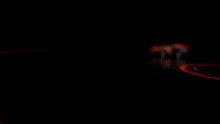 a group of toy cars are lined up on a track