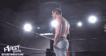 a man in a wrestling ring with the words first wrestling on the bottom right