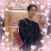 a man with a red backpack is surrounded by pink hearts and sparkles