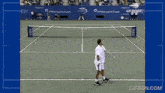 a tennis game is being played in front of a banner that says morgan chase