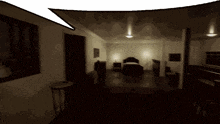 a dark room with a bed and a window