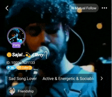 a man singing into a microphone with a mutual follow button on the bottom