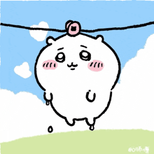 a cartoon character with a donut on its head is hanging on a clothes line