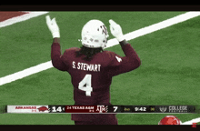 a football player wearing a maroon jersey with the number 4 on the back