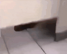 a blurred image of a person laying on a bed with a pillow .